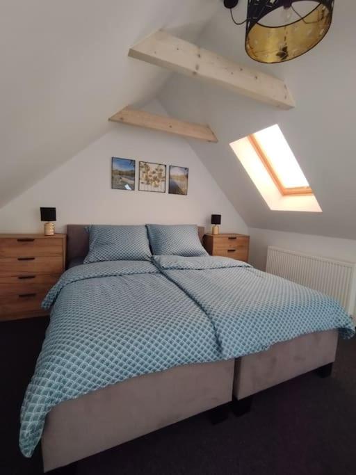 Postel nebo postele na pokoji v ubytování Apartmán Loft