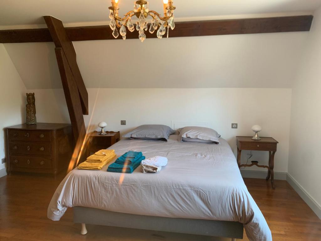 Postel nebo postele na pokoji v ubytování Longue Vue en Arbois