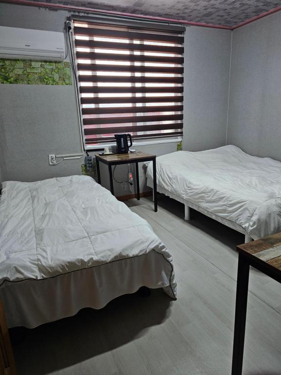 Postel nebo postele na pokoji v ubytování Mirim Motel