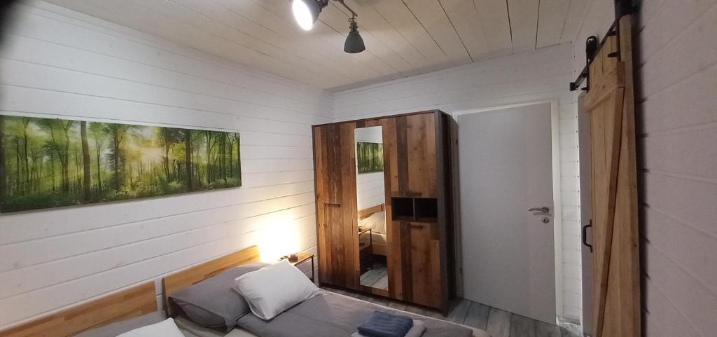 Postel nebo postele na pokoji v ubytování Ding Ding