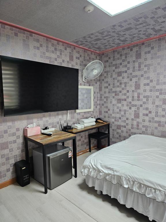 Postel nebo postele na pokoji v ubytování Mirim Motel