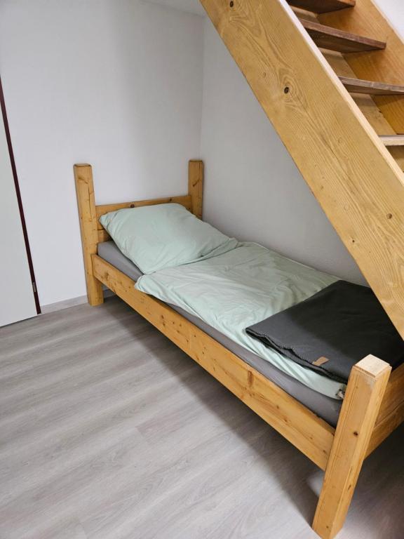 Postel nebo postele na pokoji v ubytování Kleine Jagdhütte
