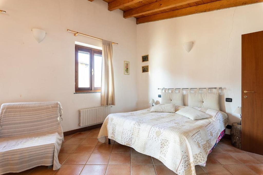 Posteľ alebo postele v izbe v ubytovaní Tenuta MonteOliveto - Classic Cottage XL - Agriturismo nelle Langhe
