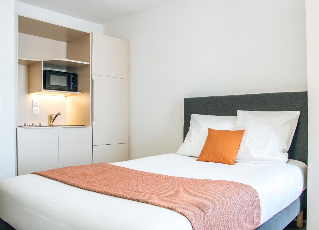 Posteľ alebo postele v izbe v ubytovaní Twenty Business Flats Lille - Bayard