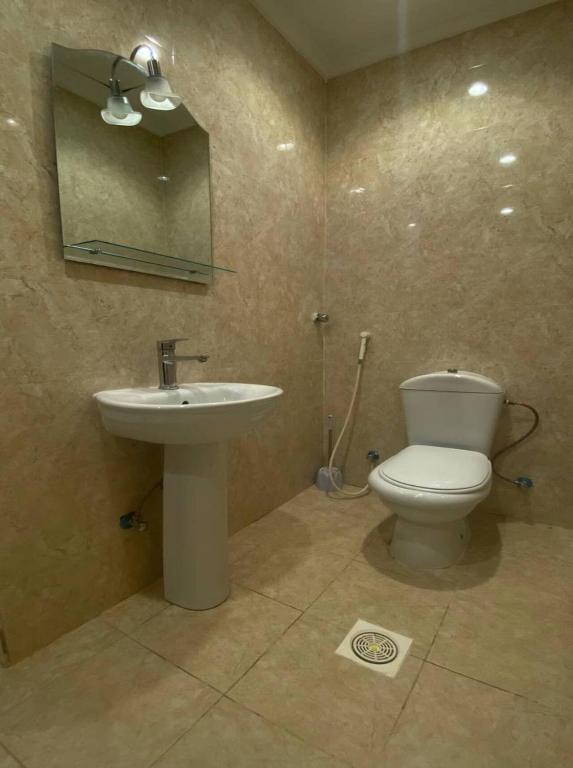 Koupelna v ubytování Al tawfeeg hotel - Al Azizyah