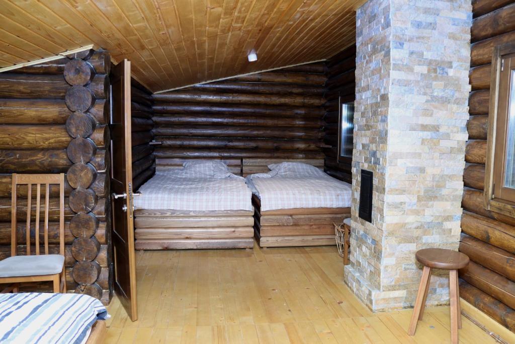 Postel nebo postele na pokoji v ubytování Majina kuća