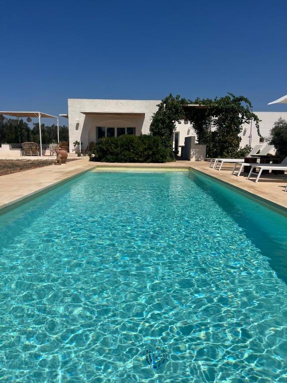 The swimming pool at or close to Villa Casa Bianca di Porto Selvaggio