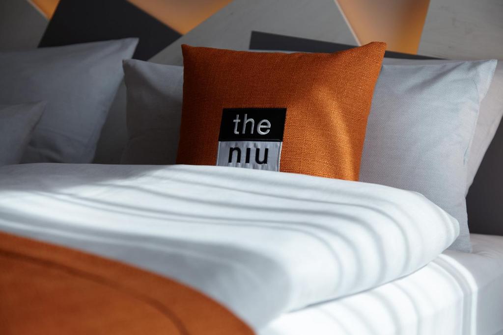 Postel nebo postele na pokoji v ubytování Holiday Inn - the niu, Hub Dusseldorf Messe by IHG