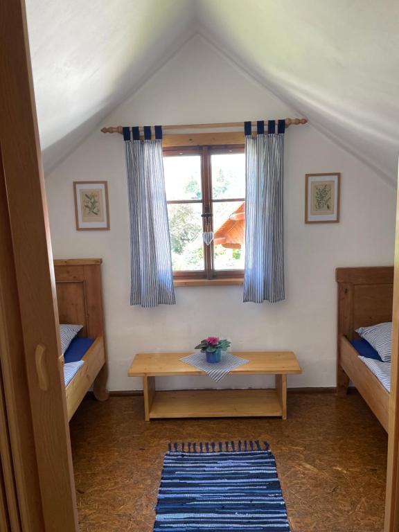 Postel nebo postele na pokoji v ubytování Apartmán U Růži