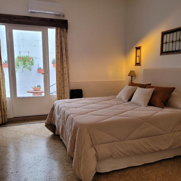 En eller flere senge i et værelse på Vitreaux