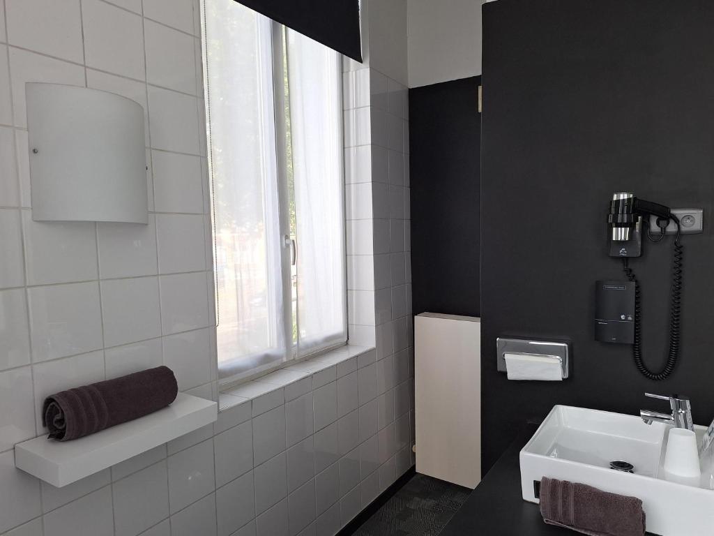 Koupelna v ubytování Hotel St James