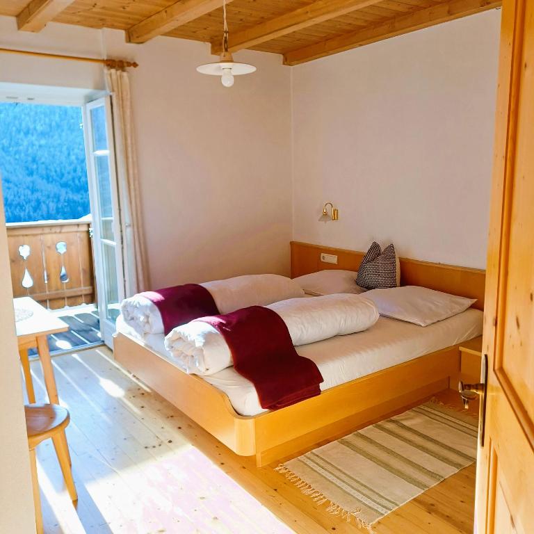 Postel nebo postele na pokoji v ubytování Villa Andre