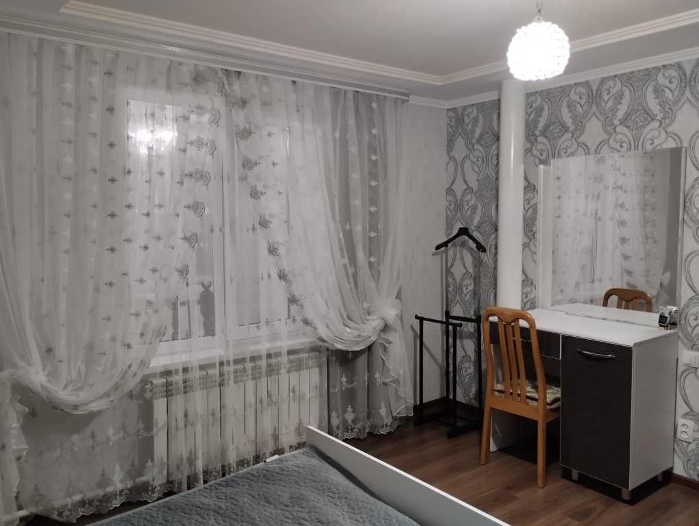 Ένα ή περισσότερα κρεβάτια σε δωμάτιο στο White cute house