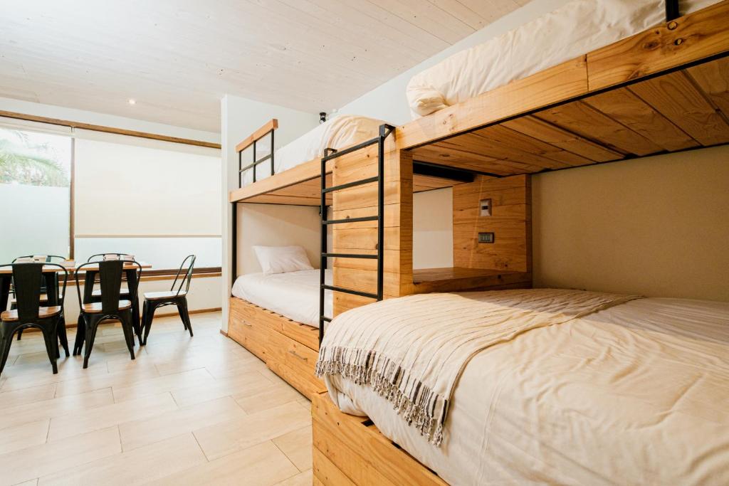 Postel nebo postele na pokoji v ubytování Hotel Mar & Vino