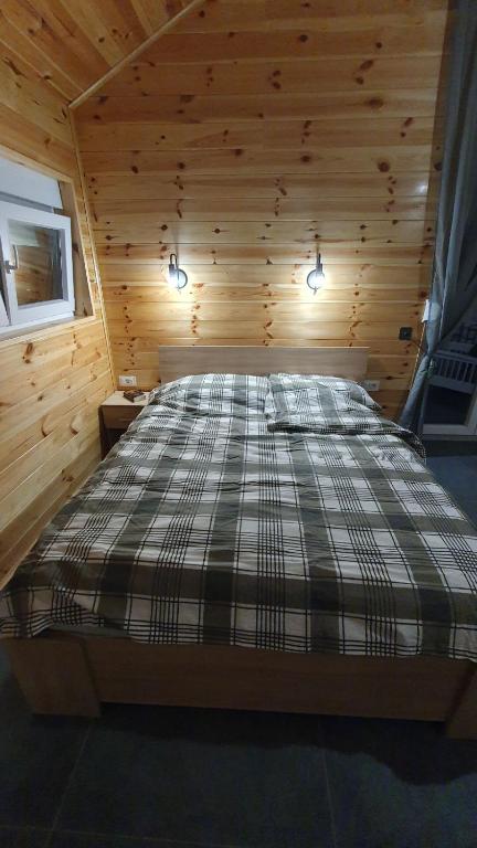 Postel nebo postele na pokoji v ubytování VIP Durmitor