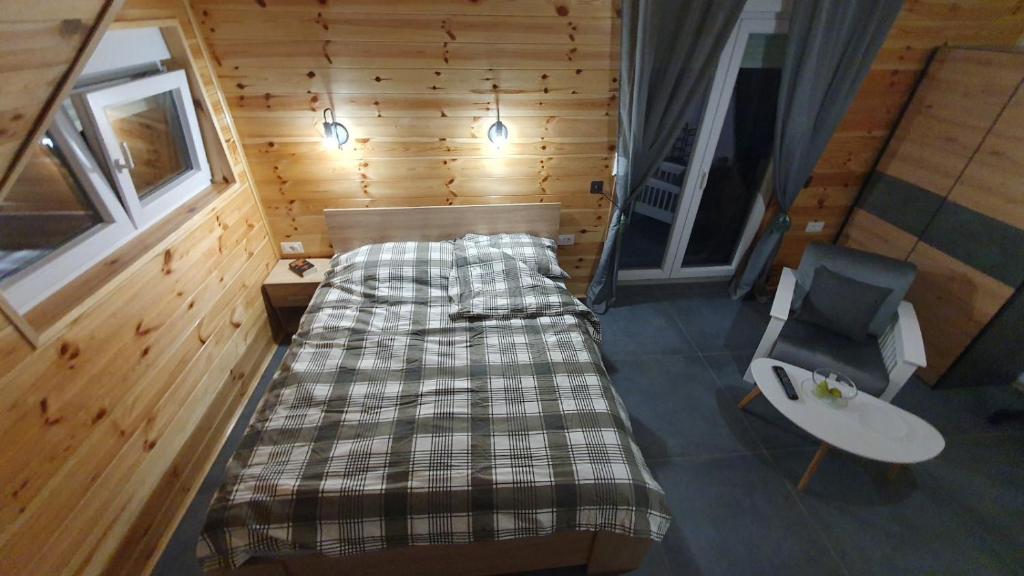 Postel nebo postele na pokoji v ubytování VIP Durmitor
