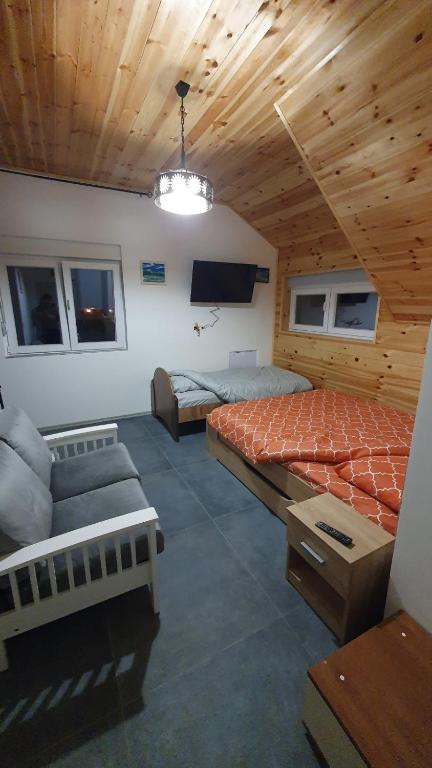 Postel nebo postele na pokoji v ubytování VIP Durmitor