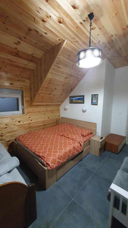 Postel nebo postele na pokoji v ubytování VIP Durmitor