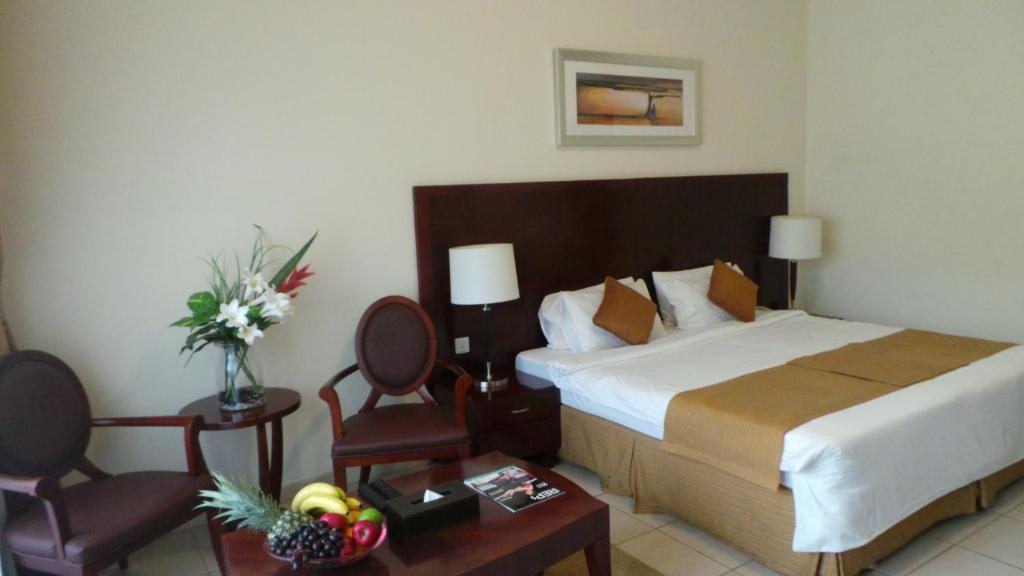 Postel nebo postele na pokoji v ubytování Akas-Inn Hotel Apartment