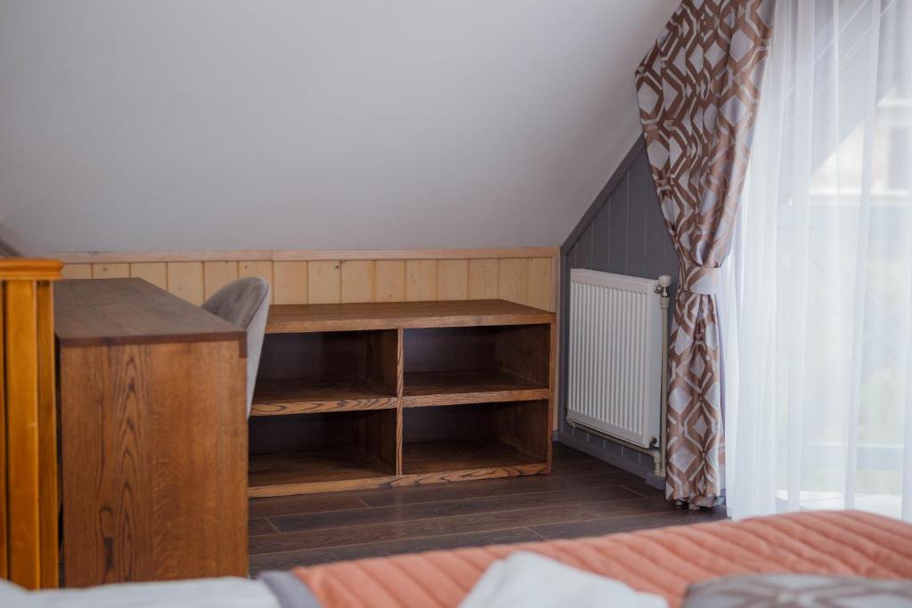 Postel nebo postele na pokoji v ubytování Hotel Monysto