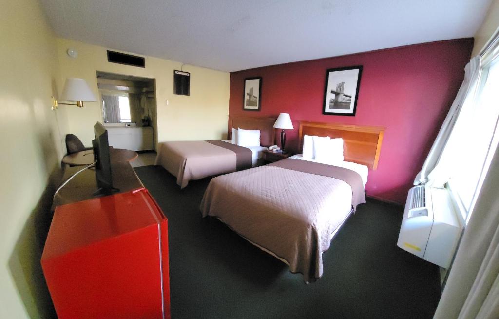 Postel nebo postele na pokoji v ubytování Newburgh Inn