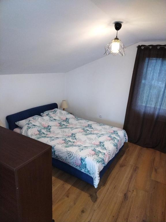 Postel nebo postele na pokoji v ubytování Apartman Sarajevo 202