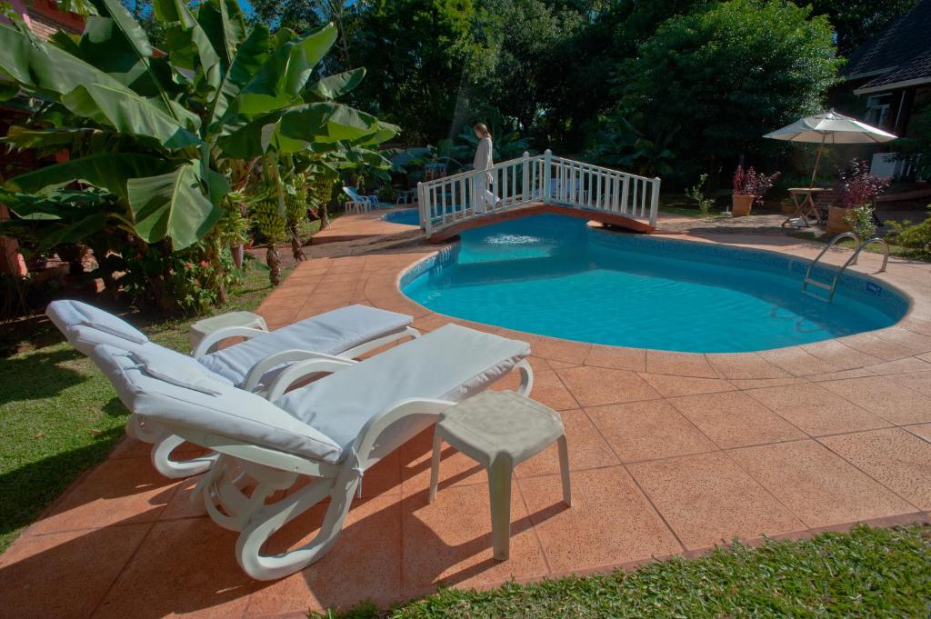 Bazén v ubytování Hotel Posada La Sorgente nebo v jeho okolí
