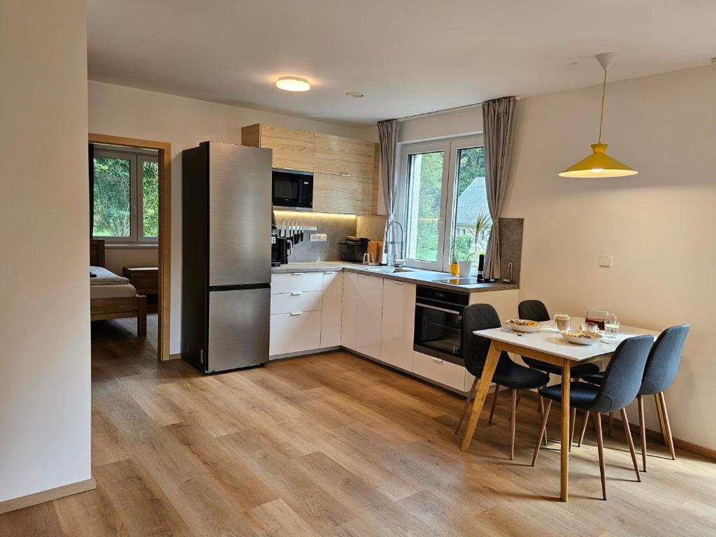 Kuchyň nebo kuchyňský kout v ubytování Apartmán v tichu