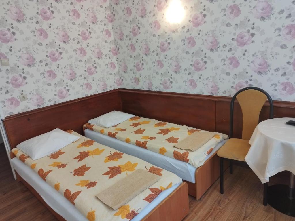 Postel nebo postele na pokoji v ubytování Ośrodek Wypoczynkowy HALIN