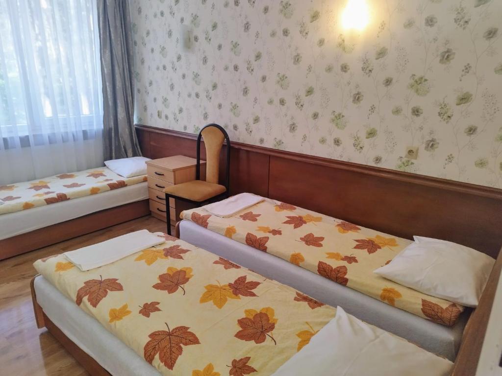 Postel nebo postele na pokoji v ubytování Ośrodek Wypoczynkowy HALIN