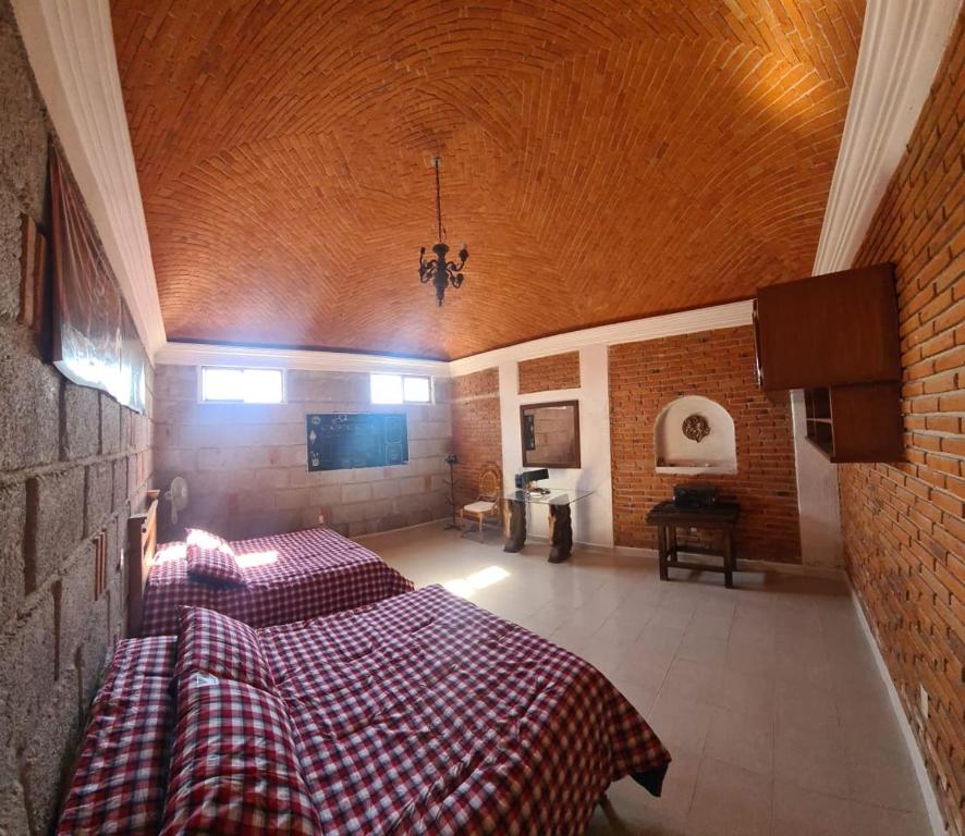 Postel nebo postele na pokoji v ubytování Casa Müi