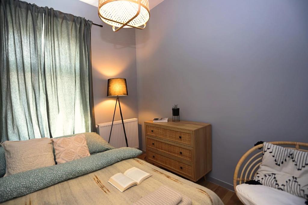 Postel nebo postele na pokoji v ubytování Apartament Sudeckie Boho