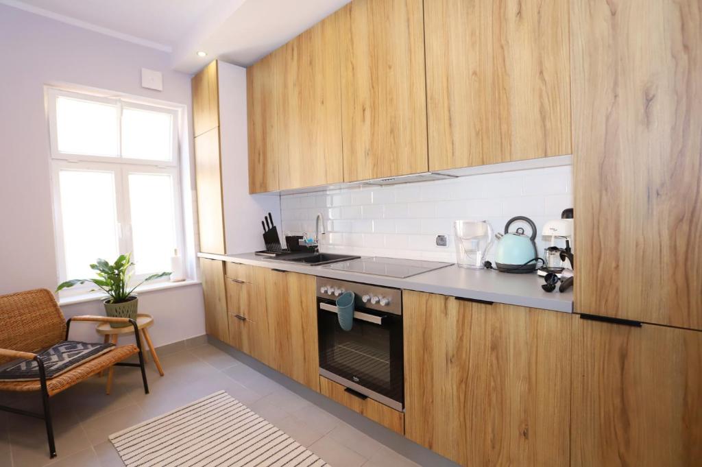 Kuchyň nebo kuchyňský kout v ubytování Apartament Sudeckie Boho