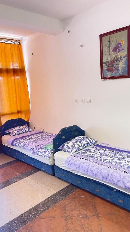 Postel nebo postele na pokoji v ubytování Hostel flash ulcinj
