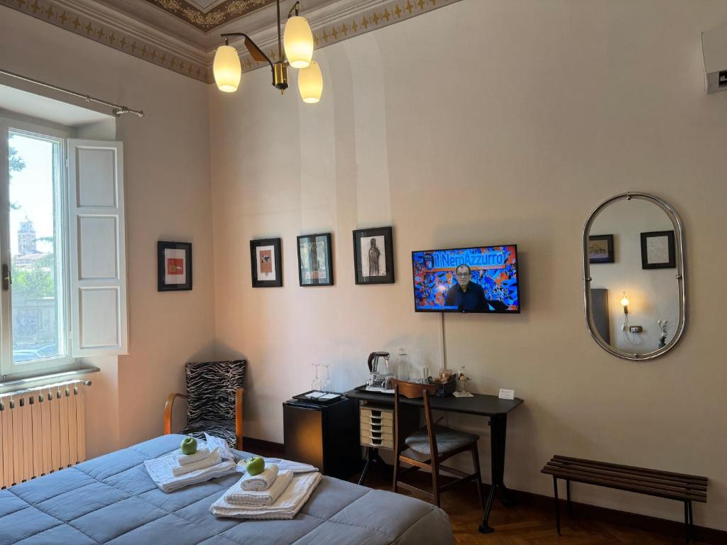 Postel nebo postele na pokoji v ubytování Le Muse
