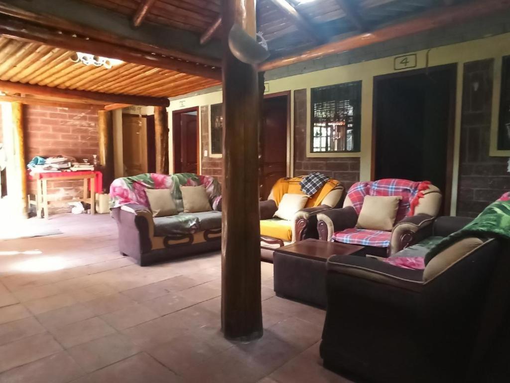 Posezení v ubytování Hostal La Rosita