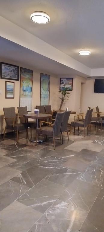 TV a/nebo společenská místnost v ubytování Hotel Bello Cordoba