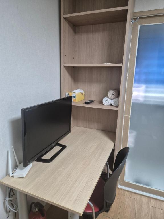 TV a/nebo společenská místnost v ubytování Petit House