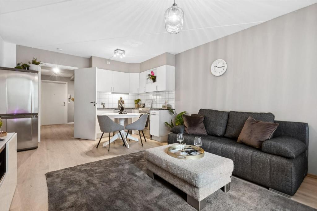 Posezení v ubytování Happy Days Relaxing room with smart solutions shared apartment with one other bedroom