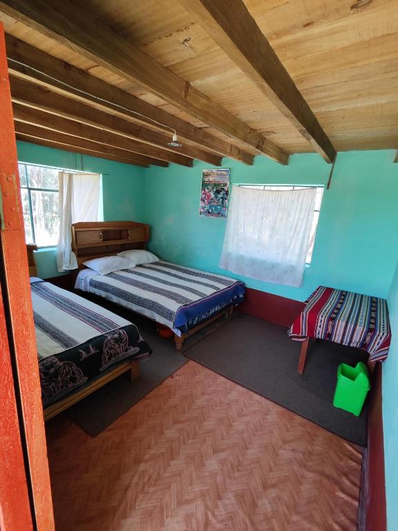 Letto o letti in una camera di Home in Taquile - Q'uñi wasi