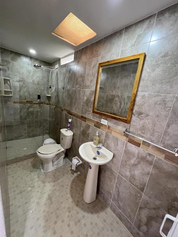 Koupelna v ubytování NUEVO Hotel Morada en el centro del Eje Cafetero