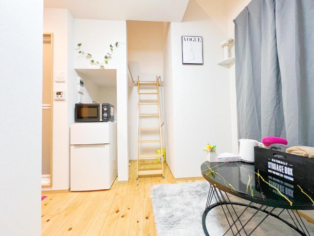 A kitchen or kitchenette at 西早稲田駅&高田馬場駅最大4人