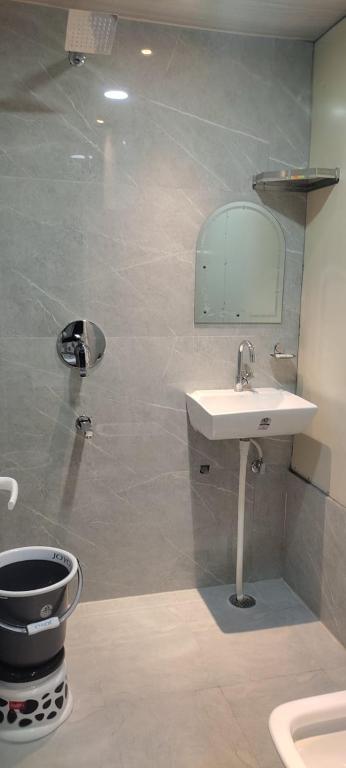 Koupelna v ubytování Sukh Sagar Hotel