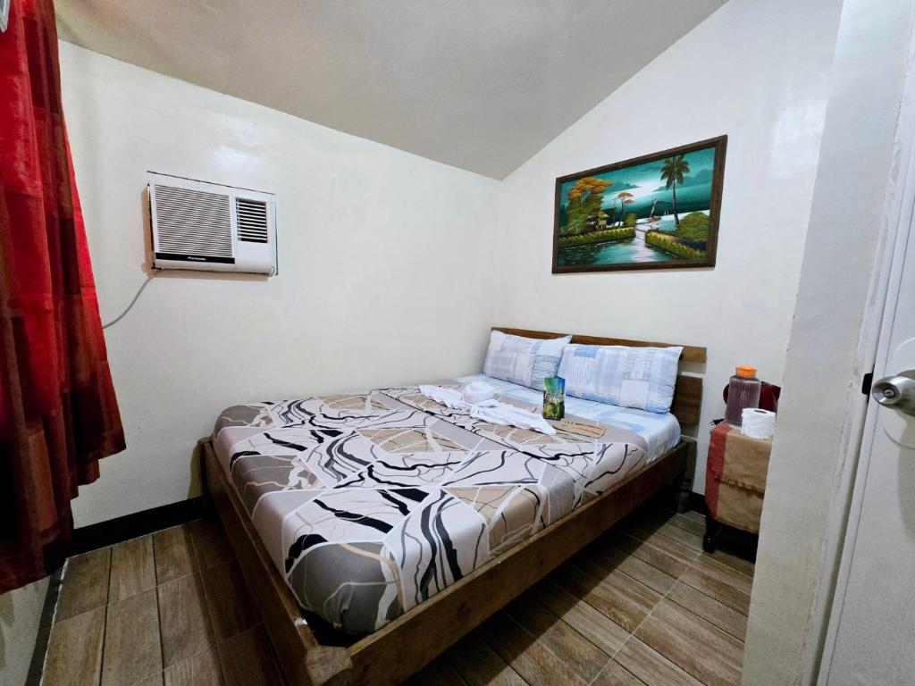 Postel nebo postele na pokoji v ubytování Southdrive Beach Resort
