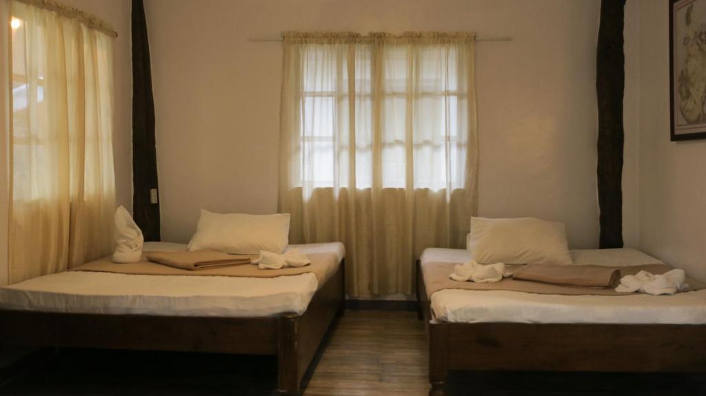 Postel nebo postele na pokoji v ubytování Southdrive Beach Resort