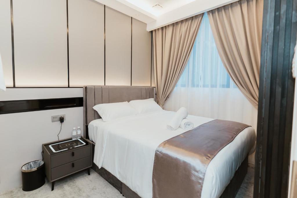 Postel nebo postele na pokoji v ubytování Brilliant Hotel Dan Spa