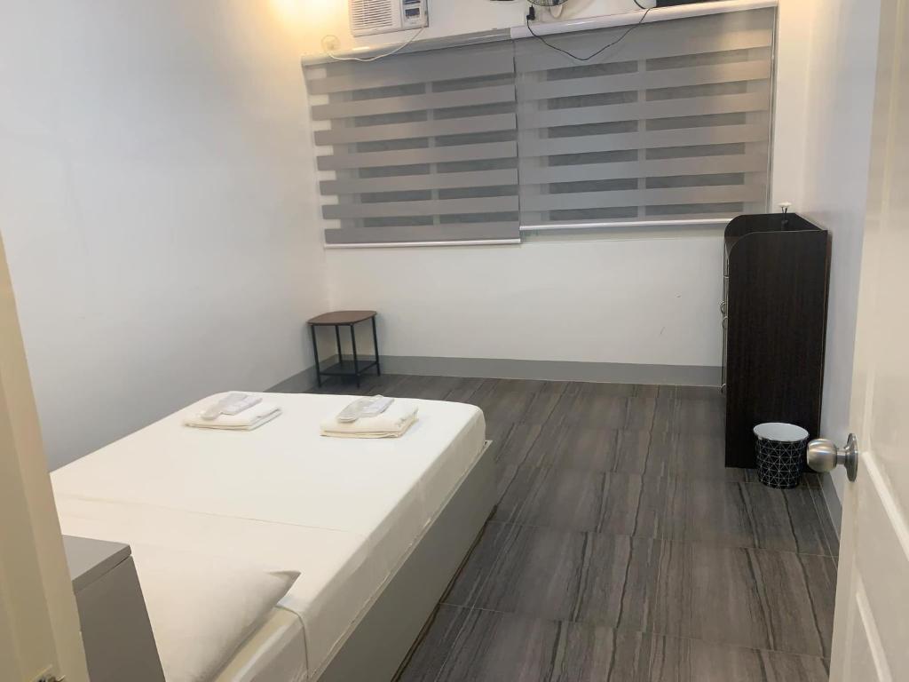 Postel nebo postele na pokoji v ubytování MAMORI HOTEL