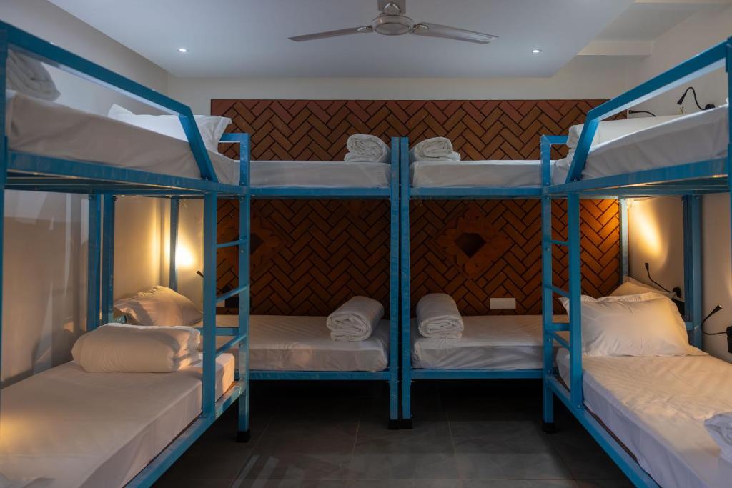 Postel nebo postele na pokoji v ubytování DownTown Hostels - Anjuna