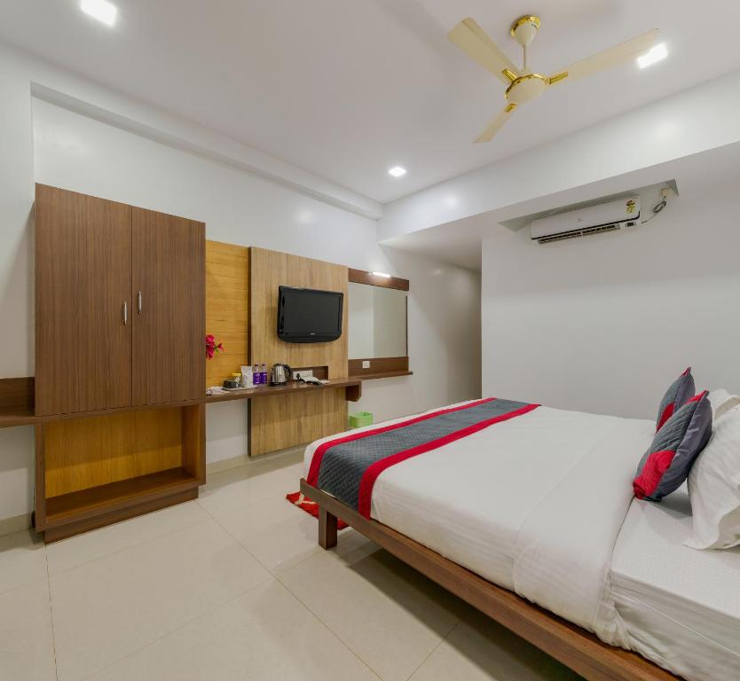 Postel nebo postele na pokoji v ubytování Hotel Vihar Deluxe