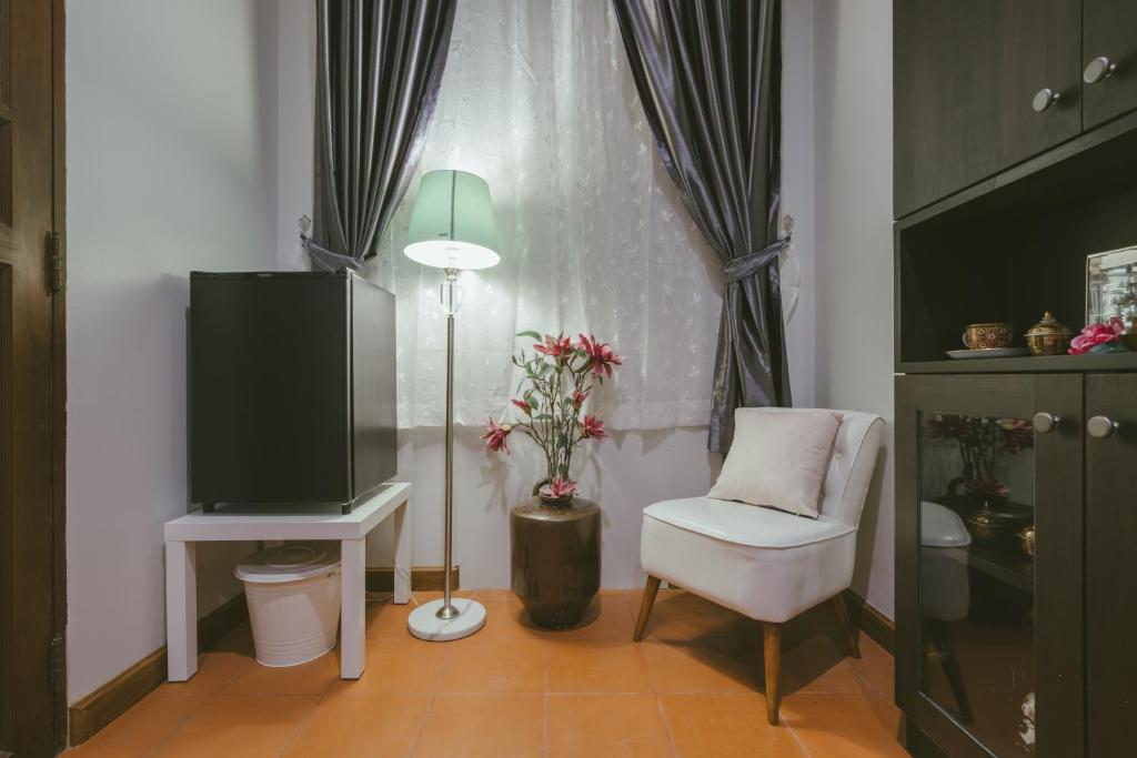 TV a/nebo společenská místnost v ubytování Botan Boutique Hotel